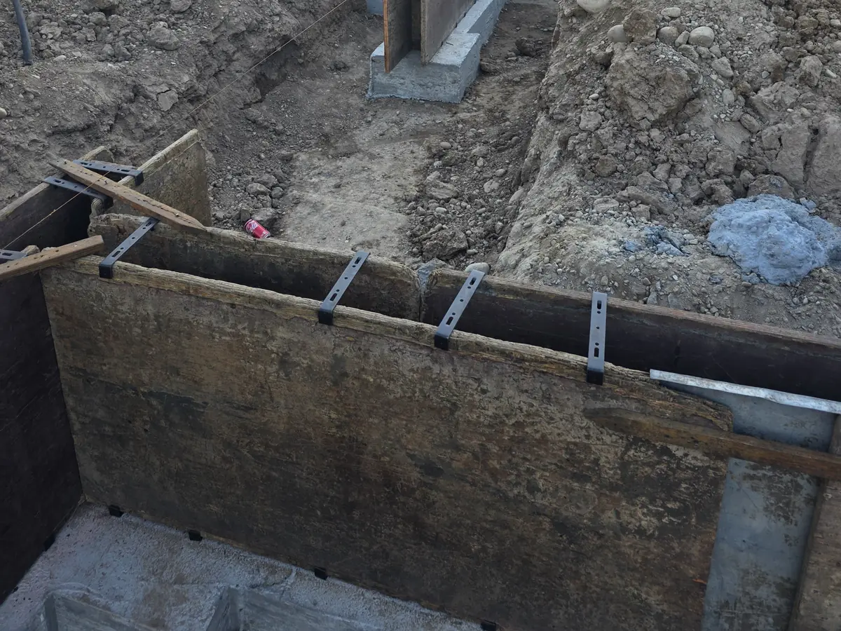 Foundation wall forms set on the footings at the Eagle custom home addition.