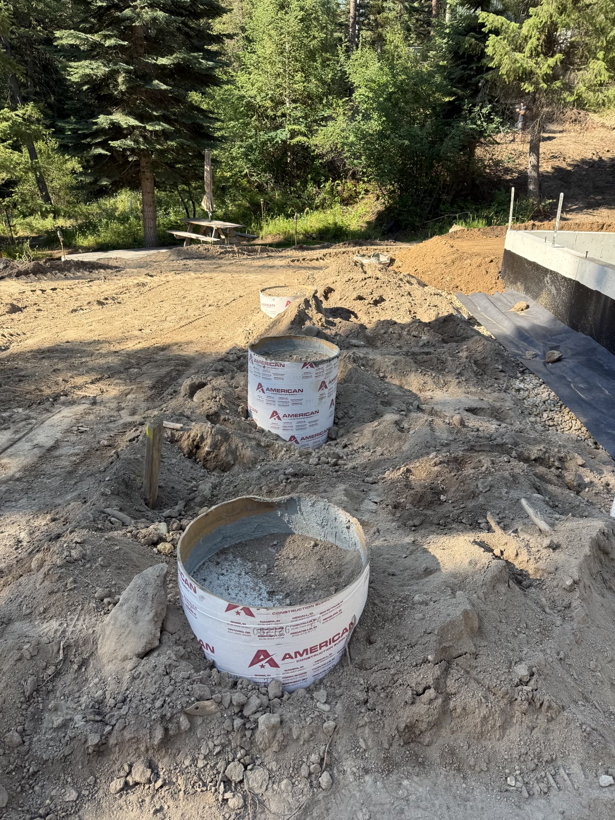 Utilities and backfill grading progress for Garden Valley Retreat, week of July 6, 2026.